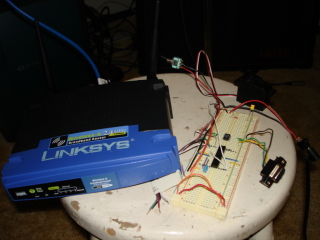 Linksys WRT54GL hooked to Atmel ATmega168